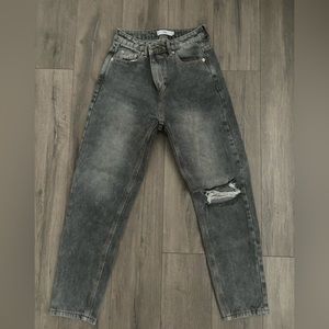 “Washed out” women’s black jeans